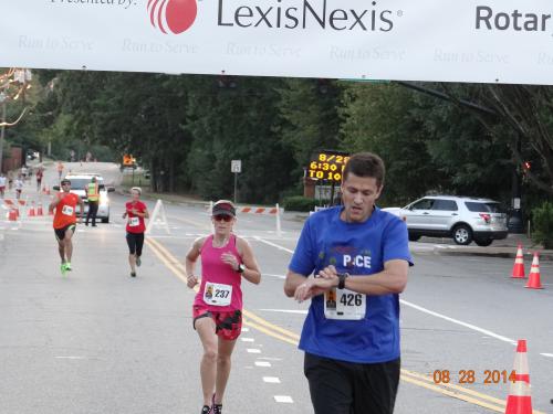 Runners crossing Finish.JPG